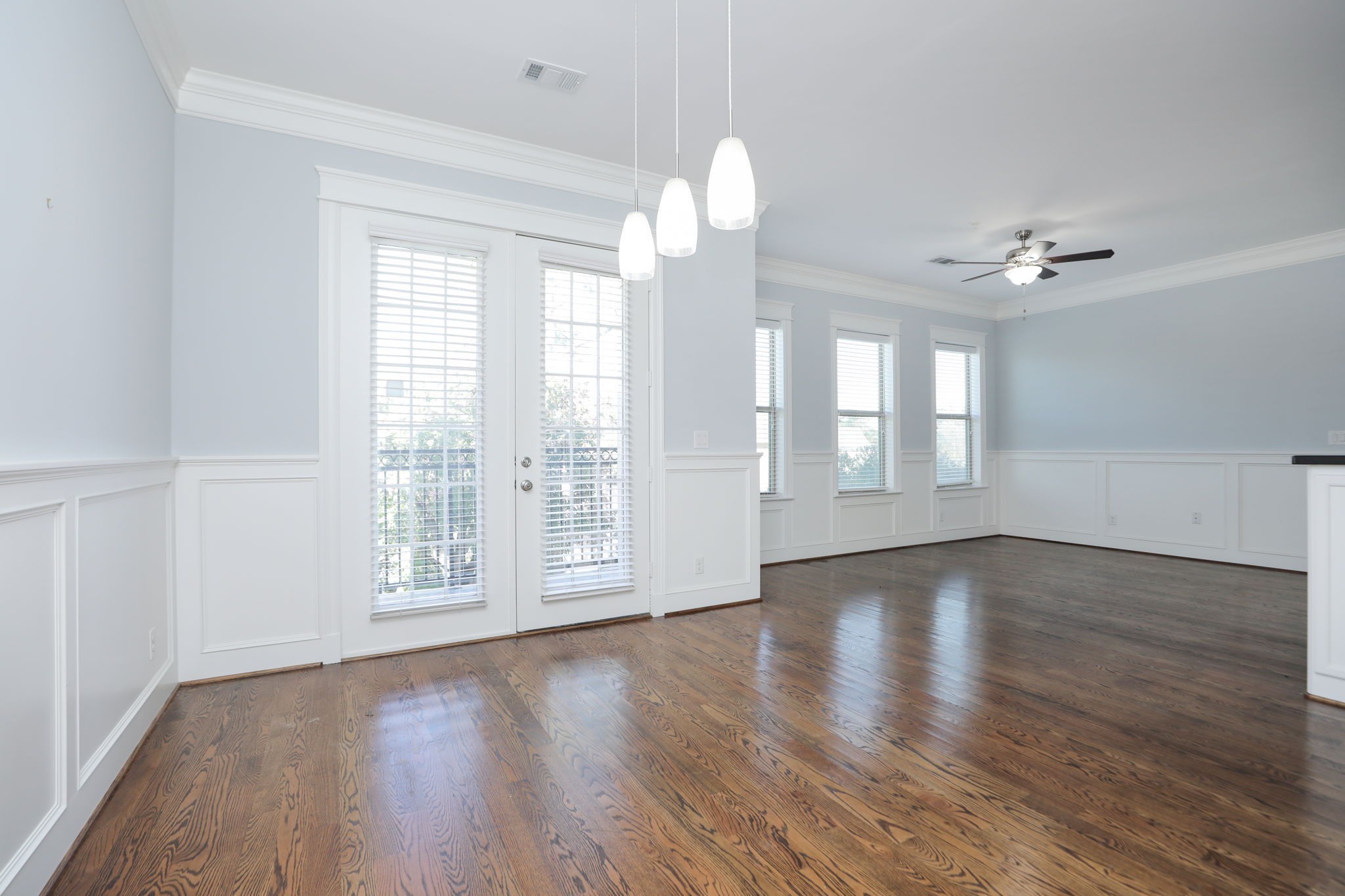 2802 Morrison Street, Unit 201 Houston, TX 77009 - Photo 21 of 50 a view of an empty room with wooden floor and a window
