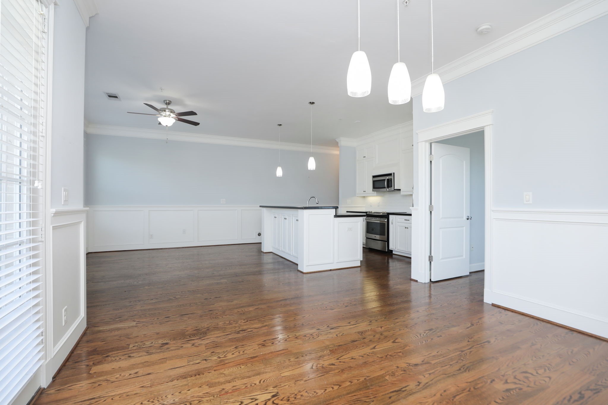 2802 Morrison Street, Unit 201 Houston, TX 77009 - Photo 22 of 50 a view of a kitchen with a sink dishwasher and a refrigerator