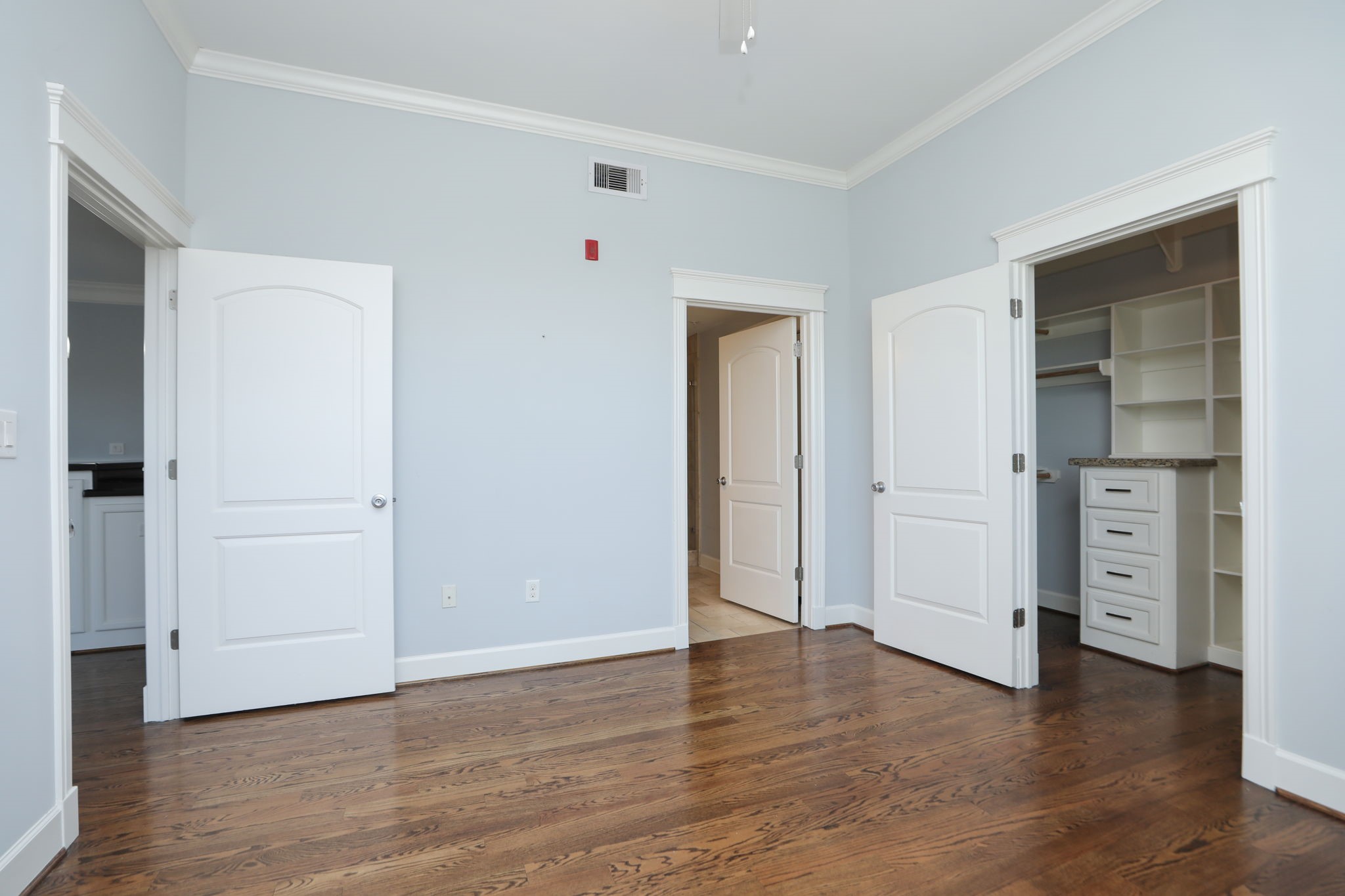 2802 Morrison Street, Unit 201 Houston, TX 77009 - Photo 30 of 50 an empty room with closet and wooden floor