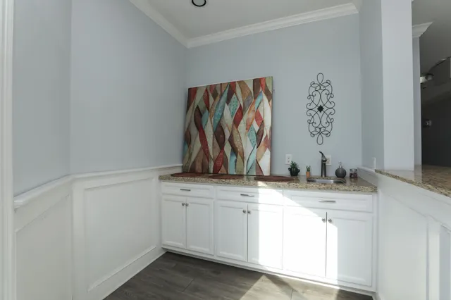 a view of a balcony with furniture
