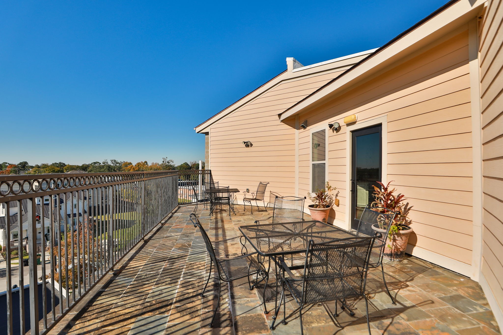 2802 Morrison Street, Unit 201 Houston, TX 77009 - Photo 39 of 50 a view of a patio with glass windows