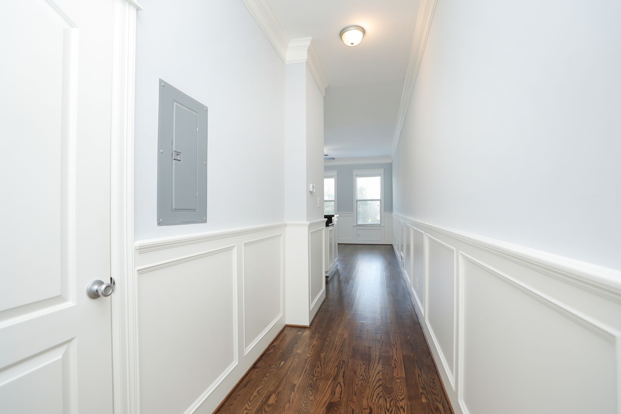 2802 Morrison Street, Unit 201 Houston, TX 77009 - Photo 4 of 50 a view of a hallway with wooden floor