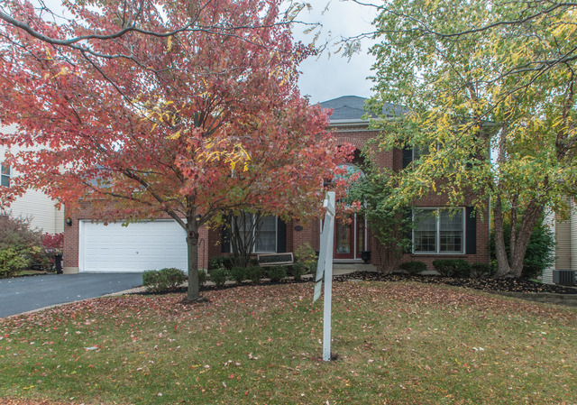 3087 Wagner Road Aurora, IL 60502 - Photo 1 of 20 a house with a tree in front of it