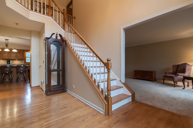 3087 Wagner Road Aurora, IL 60502 - Photo 3 of 20 a view of entryway and hall with wooden floor