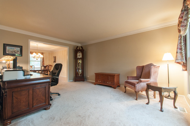 3087 Wagner Road Aurora, IL 60502 - Photo 8 of 20 a view of a workspace with furniture and a window