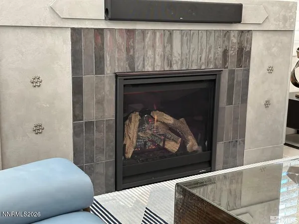 a living room with a fireplace