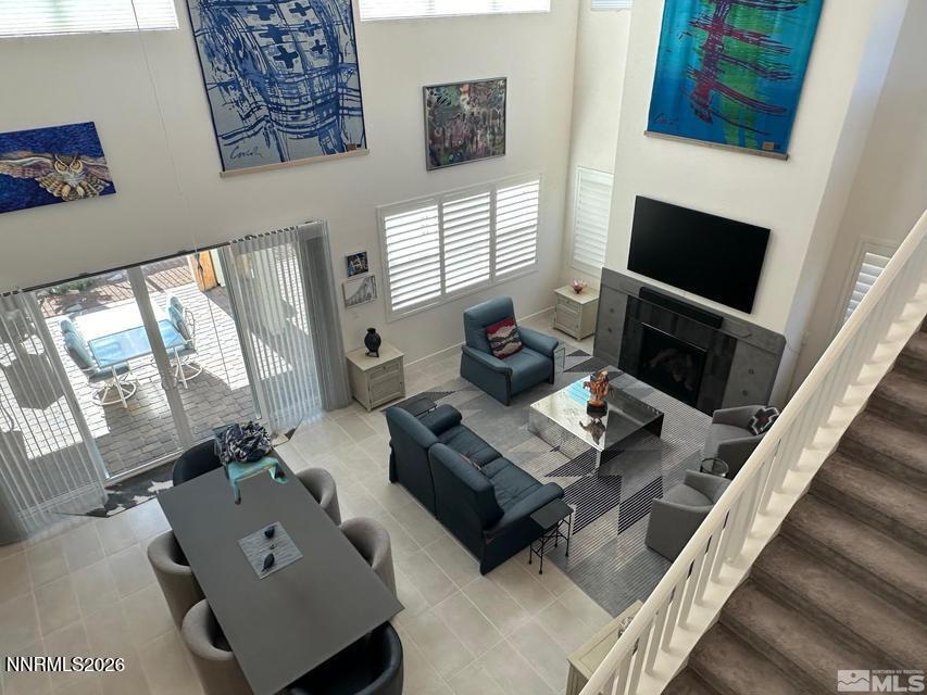 5545 Western Rider Trail Reno, NV 89511 - Photo 16 of 37 a living room with furniture and a flat screen tv