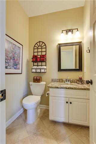 404 Orchid Road Franklin, TN 37064 - Photo 11 of 20 You don't find an upgraded half bath like these very often! Ceramic tile and newly installed granite! You don't have to do a thing!