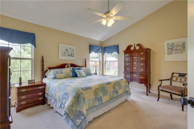 404 Orchid Road Franklin, TN 37064 - Photo 12 of 20 Large master suite upstairs with ceiling fan and walk-in closet.