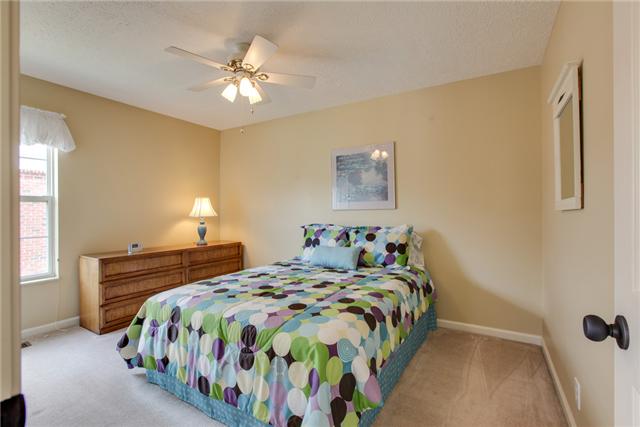 404 Orchid Road Franklin, TN 37064 - Photo 15 of 20 One of two secondary bedrooms upstairs! Walk-in closet in this bedroom and a bathroom down the hall that is the same finishes as the rest of the bathrooms!