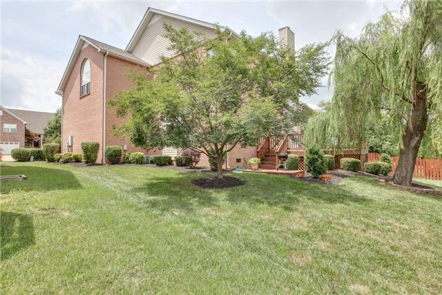 404 Orchid Road Franklin, TN 37064 - Photo 18 of 20 Beautiful backyard, nicely manicured and you will love how well they have cared for this beautiful willow tree! Tons of privacy because you back to common space!