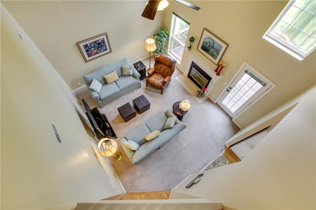 404 Orchid Road Franklin, TN 37064 - Photo 3 of 20 Two story ceiling and wall of windows allow tons of light in this room! l