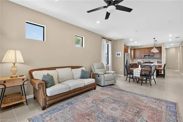 a living room with furniture and a table