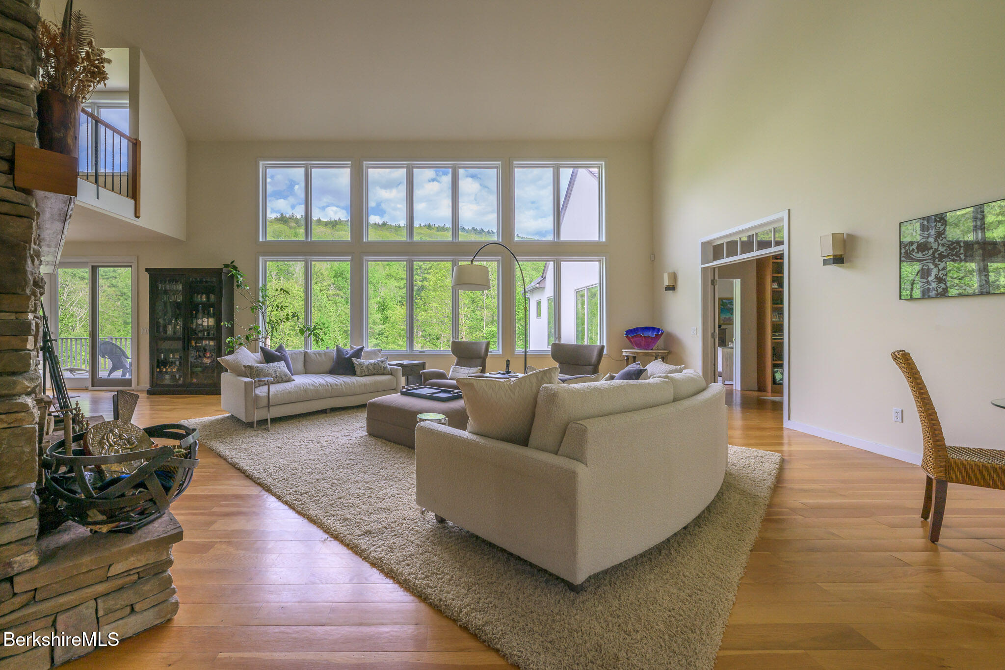 83 Maple Hill Road West Stockbridge, MA 01266 - Photo 11 of 78 a living room with furniture and a large window