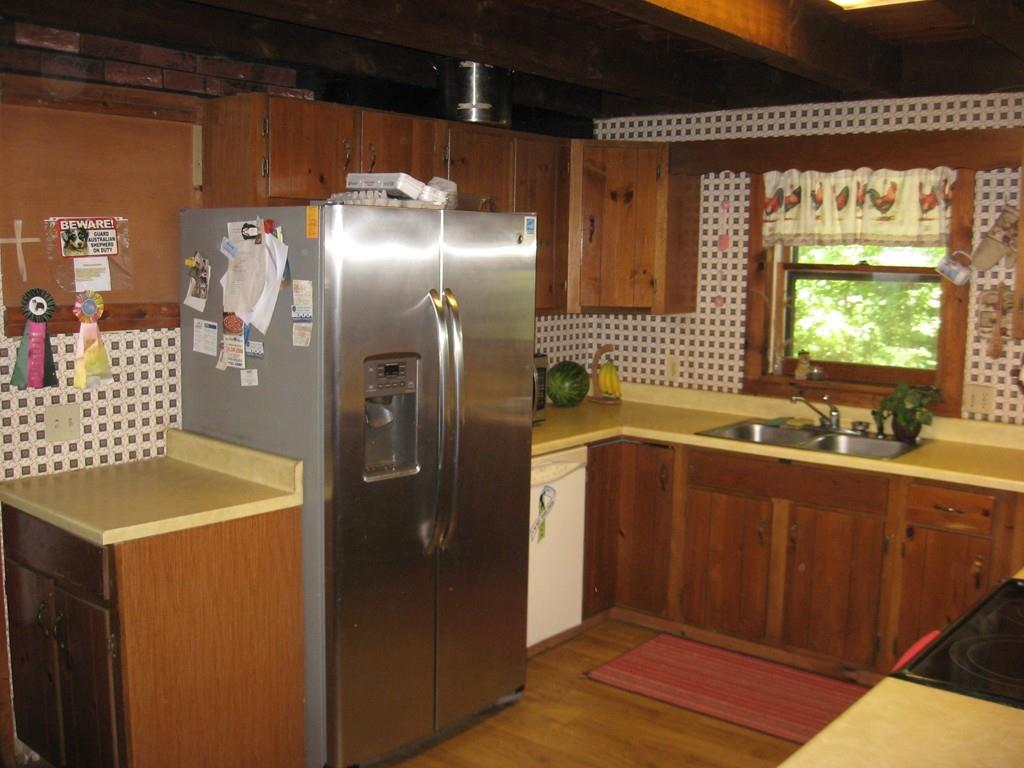 229 White Pond Road Athol, MA 01331 - Photo 11 of 42 a kitchen with stainless steel appliances granite countertop a refrigerator and a sink