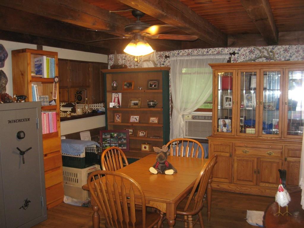 229 White Pond Road Athol, MA 01331 - Photo 13 of 42 a dinning table and chairs in a room