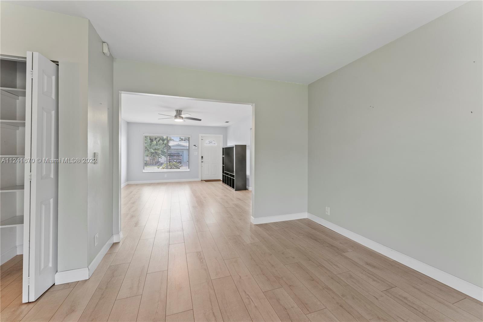 3166 Northwest 68th Court Fort Lauderdale, FL 33309 - Photo 14 of 36 a view of an empty room and glass door
