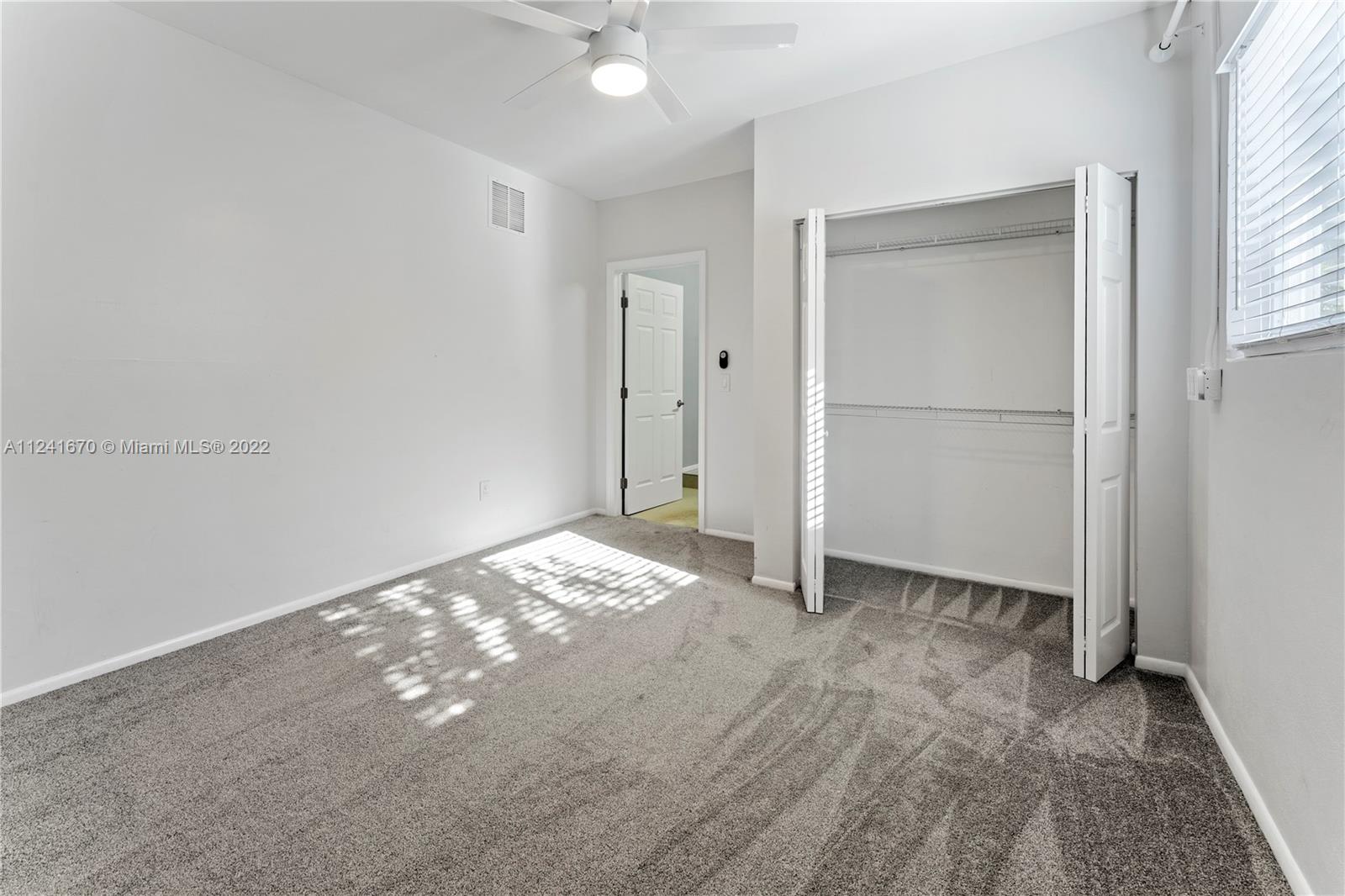 3166 Northwest 68th Court Fort Lauderdale, FL 33309 - Photo 34 of 36 an empty room with a natural light