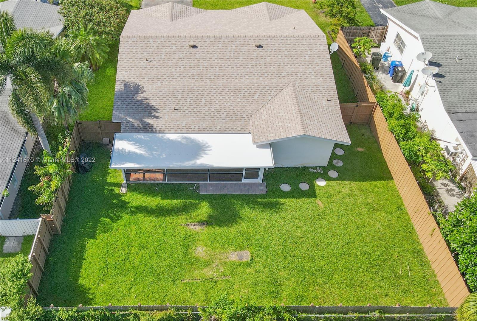 3166 Northwest 68th Court Fort Lauderdale, FL 33309 - Photo 4 of 36 an aerial view of a house