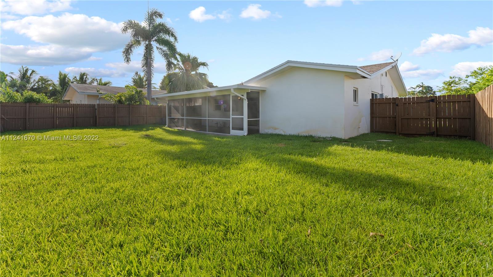 3166 Northwest 68th Court Fort Lauderdale, FL 33309 - Photo 9 of 36 a view of a backyard