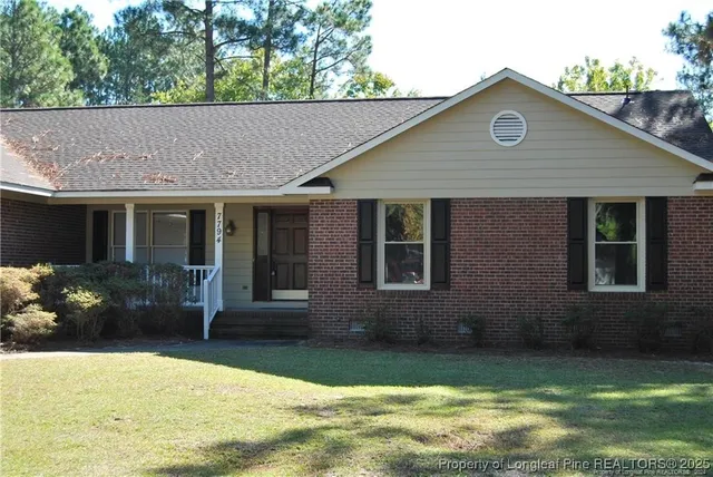 a house view with a garden space