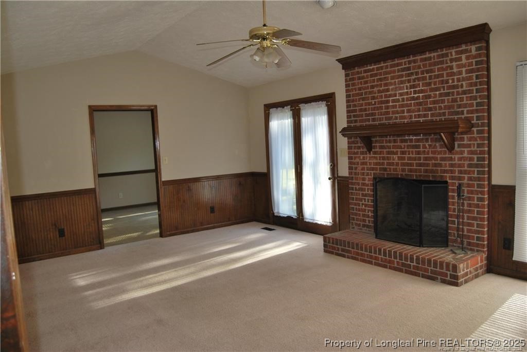 7794 Privet Court Fayetteville, NC 28311 - Photo 3 of 19 a living room with furniture and a fireplace