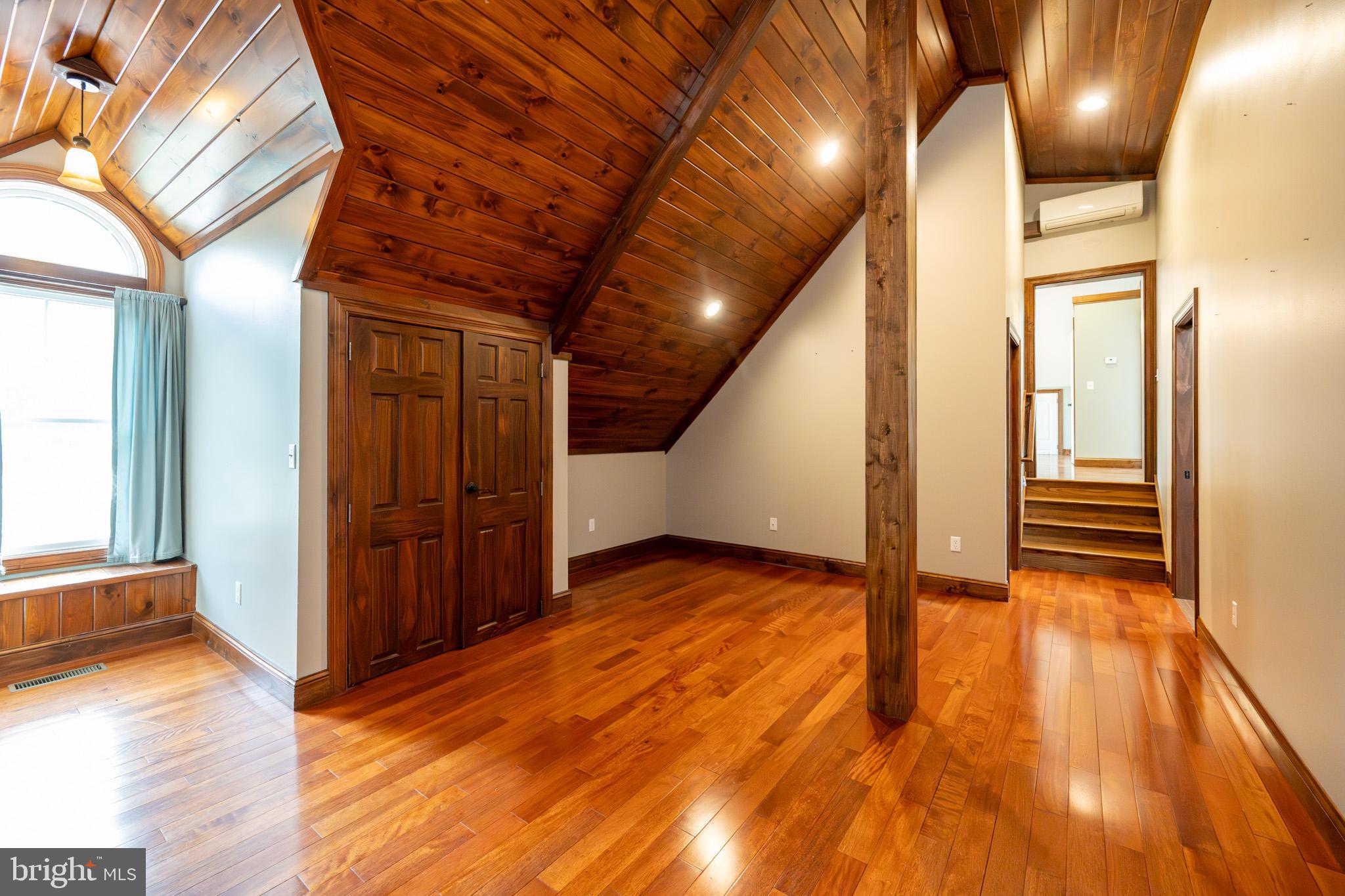 1909 Pysell Crosscut Road Oakland, MD 21550 - Photo 30 of 82 a view of an empty room with wooden floor