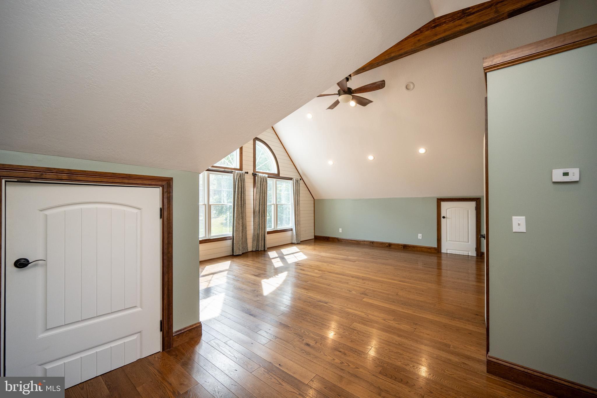 1909 Pysell Crosscut Road Oakland, MD 21550 - Photo 40 of 82 a view of a hallway with wooden floor