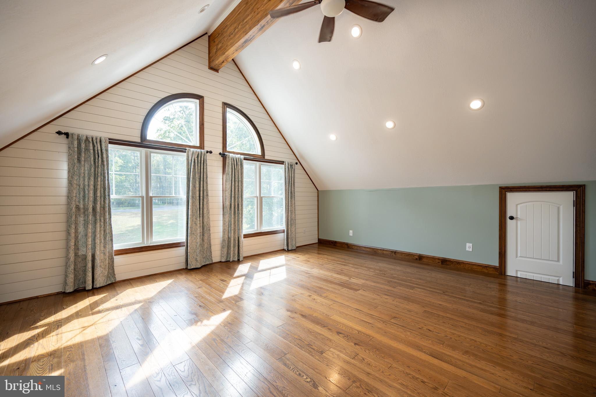 1909 Pysell Crosscut Road Oakland, MD 21550 - Photo 42 of 82 a view of an empty room with glass door