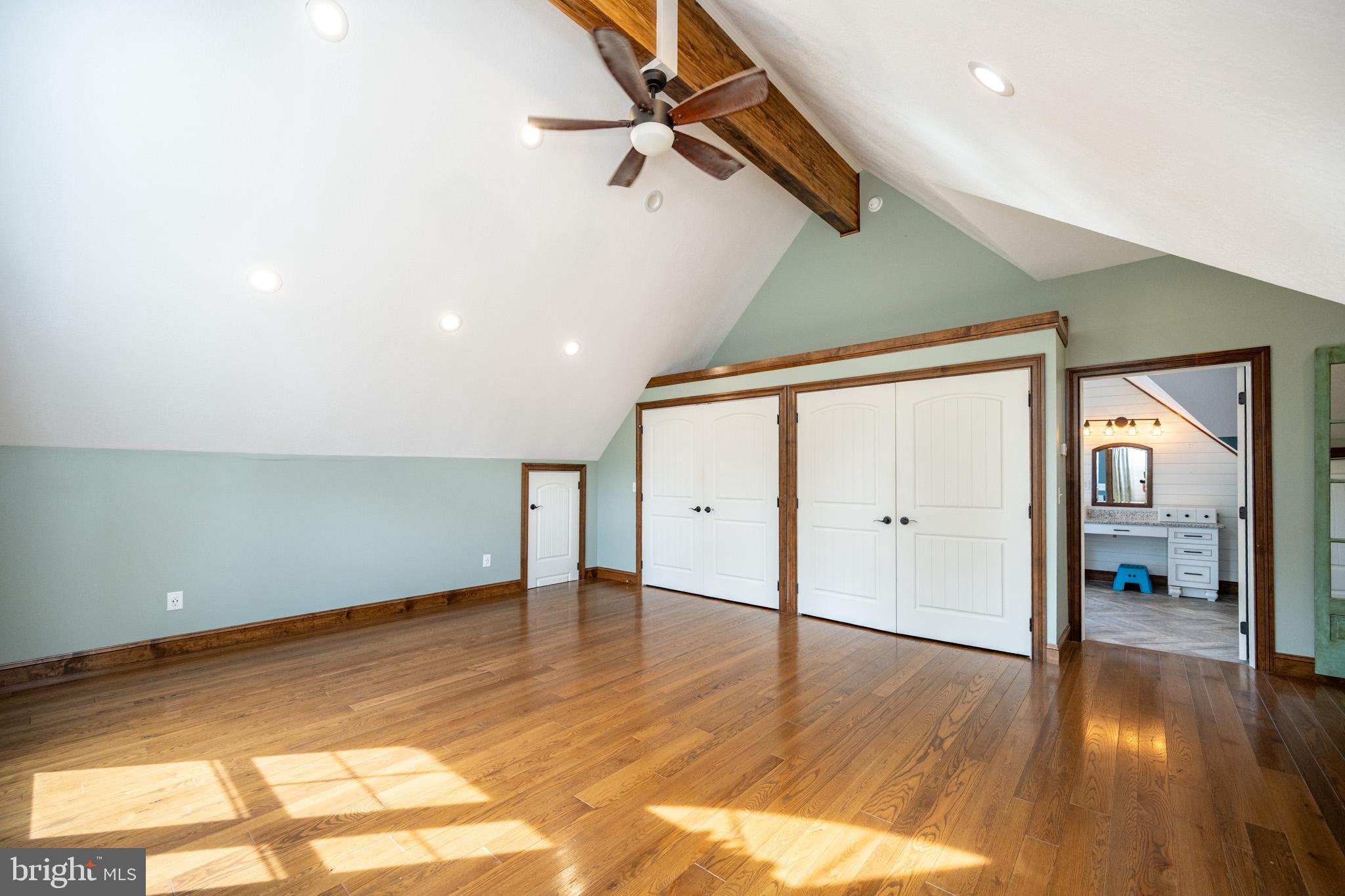 1909 Pysell Crosscut Road Oakland, MD 21550 - Photo 43 of 82 a view of an empty room with wooden floor and a window