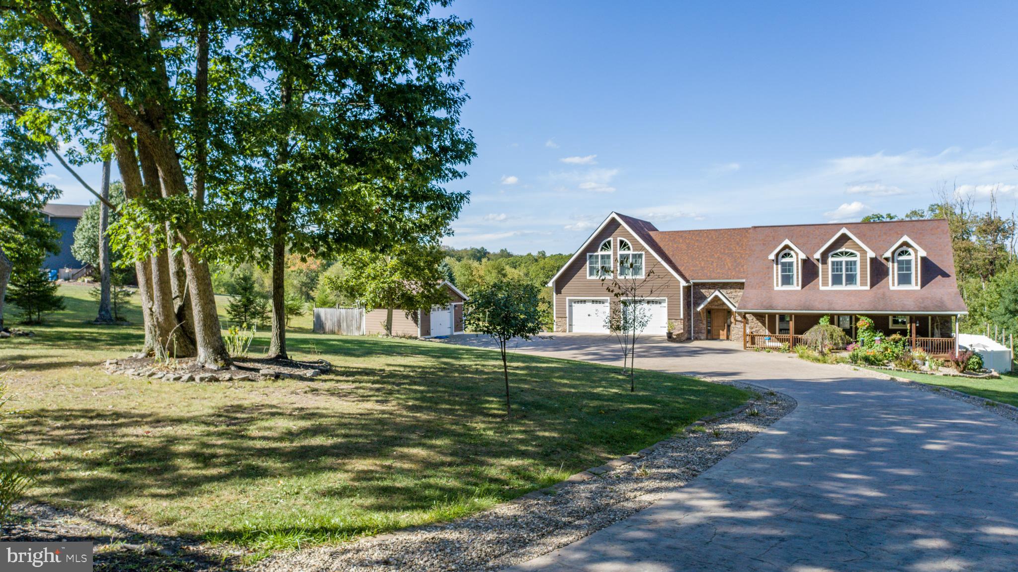 1909 Pysell Crosscut Road Oakland, MD 21550 - Photo 7 of 82 Storage shed on left of house