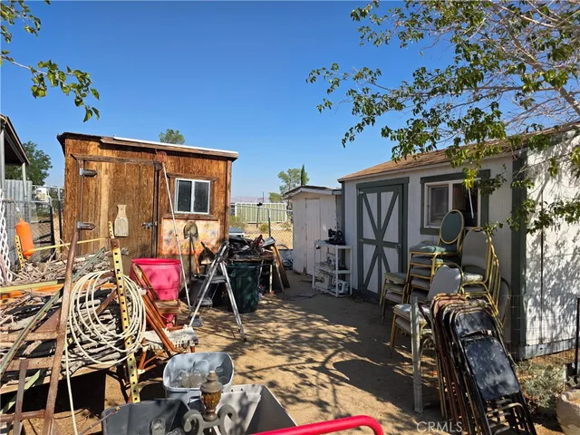 a view of road with large trees