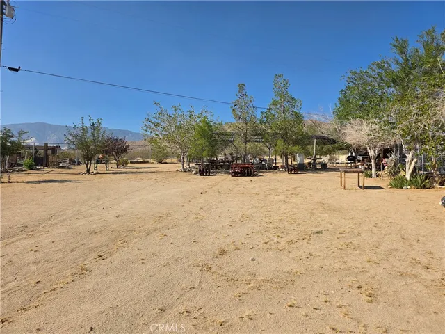 a view of a street with cars