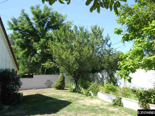 1172 Williams Avenue Reno, NV 89503 - Photo 6 of 6 a view of a yard with plants and a bench