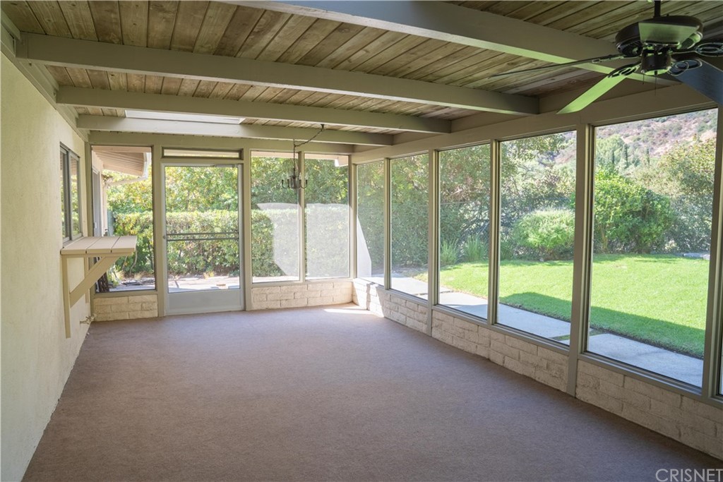 17236 Escalon Drive Encino, CA 91436 - Photo 6 of 12 a view of room with window and an outdoor view