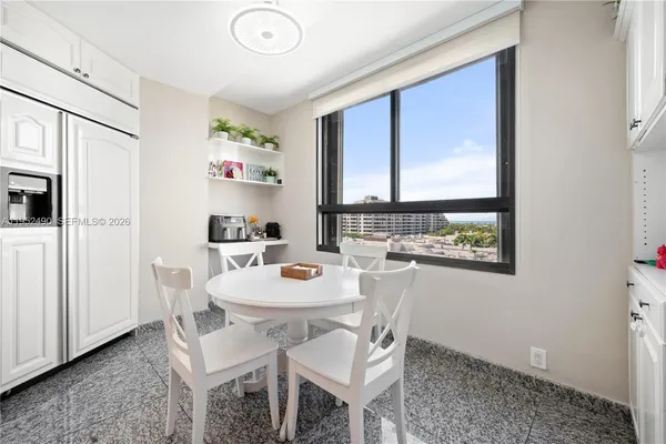 a view of a dining room with furniture