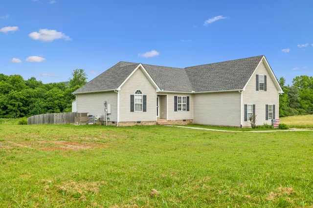 a view of a kitchen with refrigerator