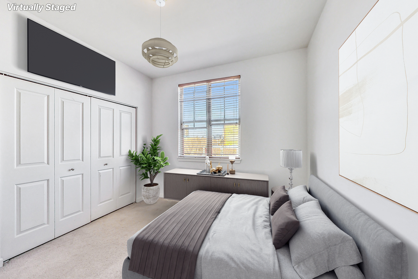 45 East 23rd Street Chicago, IL 60616 - Photo 17 of 27 a bedroom with a bed and a chandelier