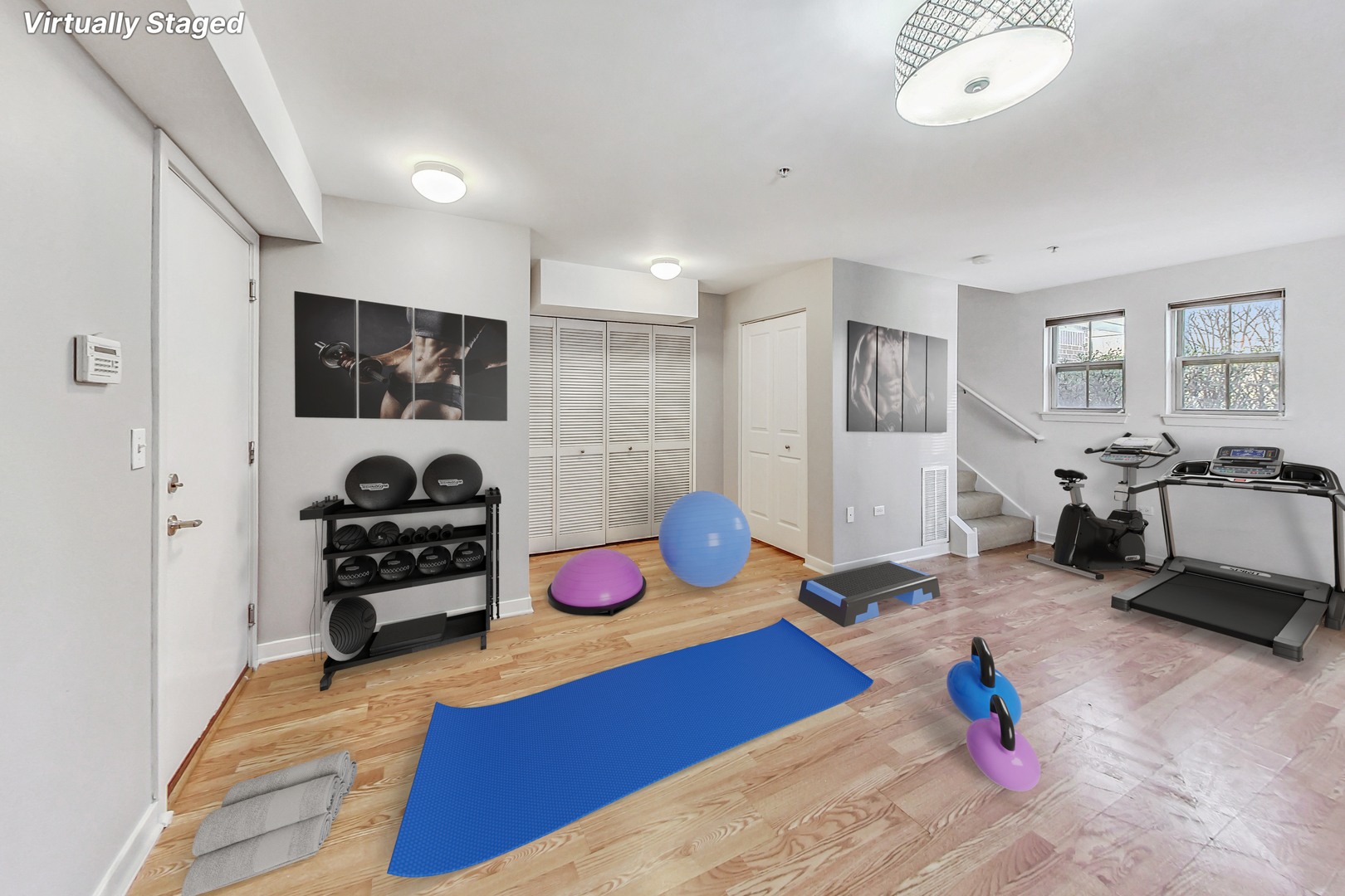 45 East 23rd Street Chicago, IL 60616 - Photo 19 of 27 a bedroom with furniture and a flat screen tv