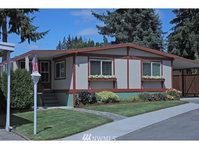 2500 South 370th Street, Unit 12 Federal Way, WA 98003 - Photo 2 of 40 a view of a house with backyard