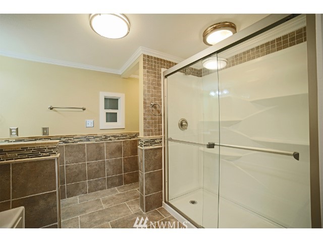 2500 South 370th Street, Unit 12 Federal Way, WA 98003 - Photo 29 of 40 a bathroom with a shower and a sink