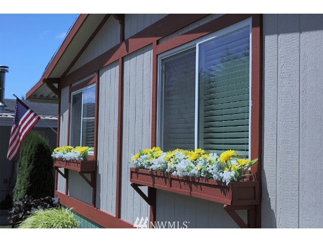 2500 South 370th Street, Unit 12 Federal Way, WA 98003 - Photo 3 of 40 a house view with a outdoor space