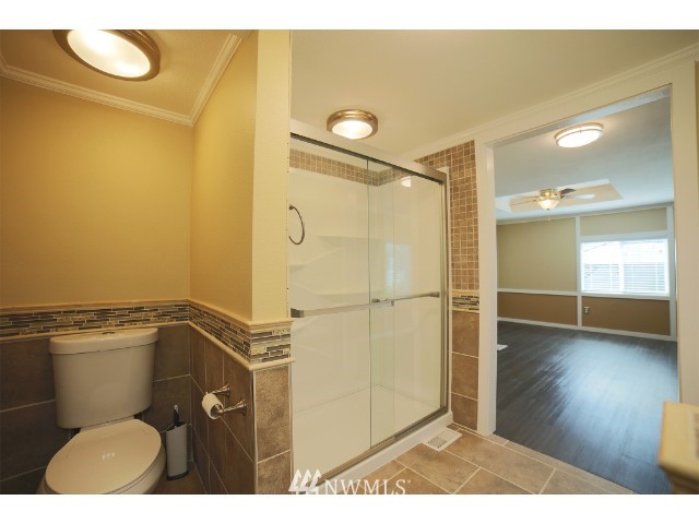 2500 South 370th Street, Unit 12 Federal Way, WA 98003 - Photo 31 of 40 a bathroom with a sink and a mirror