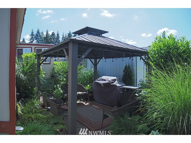 2500 South 370th Street, Unit 12 Federal Way, WA 98003 - Photo 35 of 40 a view of outdoor space living space and yard