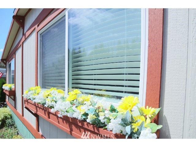 2500 South 370th Street, Unit 12 Federal Way, WA 98003 - Photo 7 of 40 a view of a flowers in the back