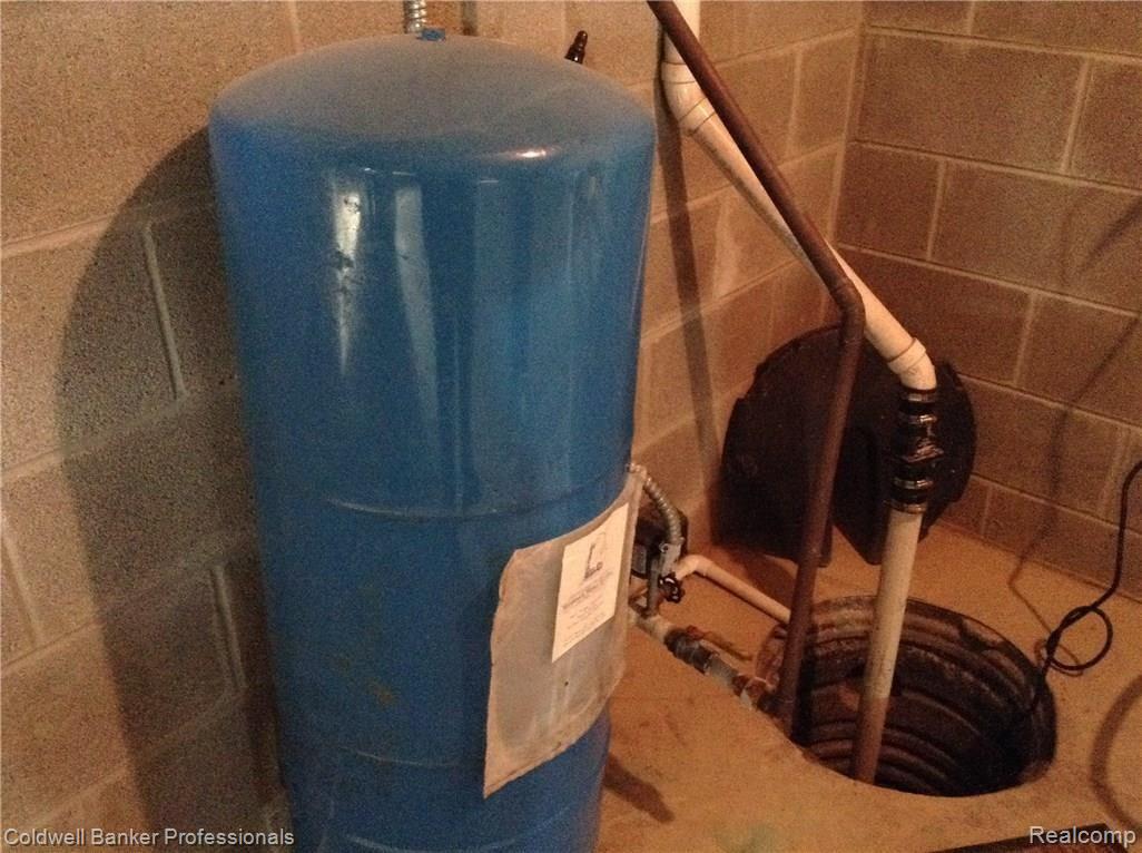 1840 South Summers Road Imlay City, MI 48444 - Photo 37 of 53 Water bladder Sump Pump.JPG