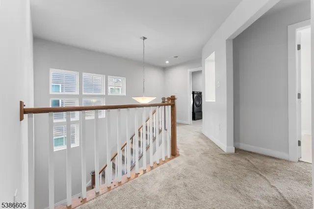 a view of hallway with stairs