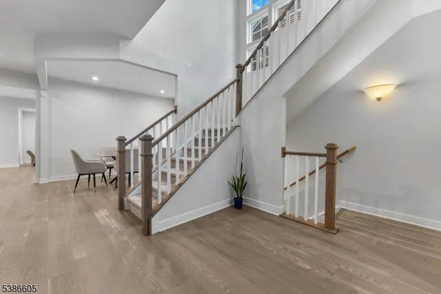 a view of entryway with wooden floor