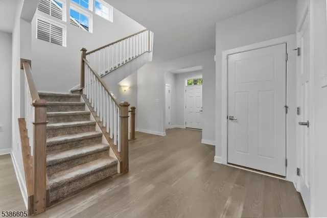 a view of entryway with wooden floor