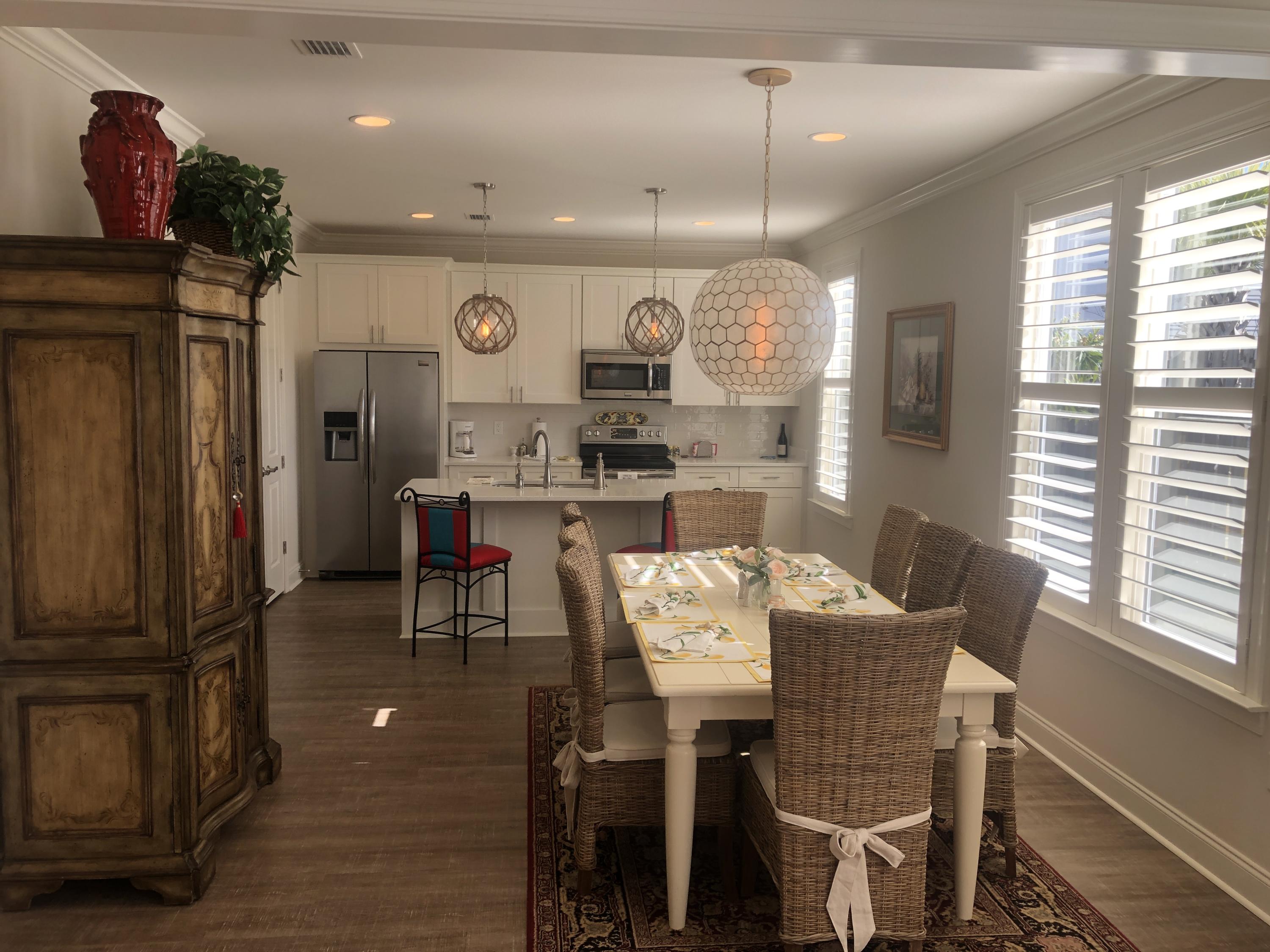 52 Chapman Street Santa Rosa Beach, FL 32459 - Photo 11 of 50 a view of a dining room with furniture window and outside view